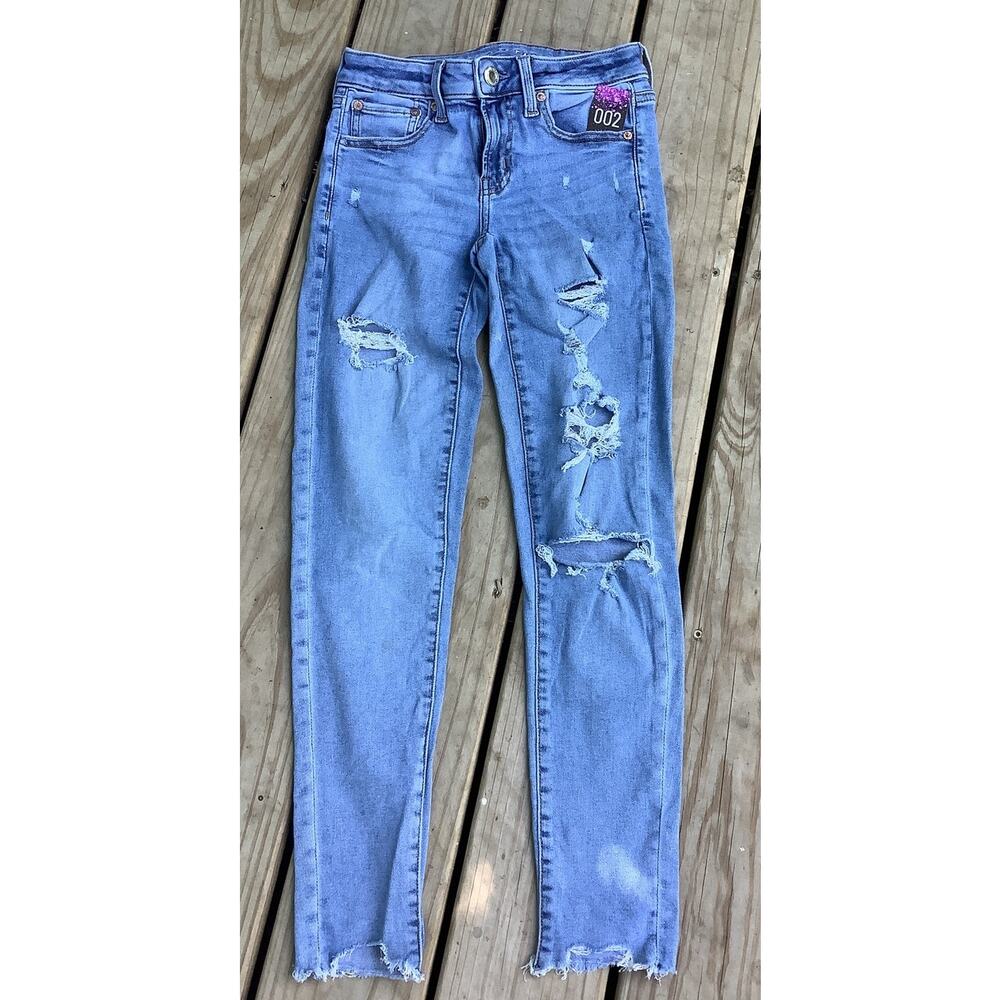 American Eagle Destroyed Jeggings Size 2 Next Level Stretch Ripped Raw Hem Blue
